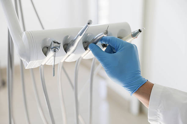 Professional Tooth Extraction technician working in Sanford, NC